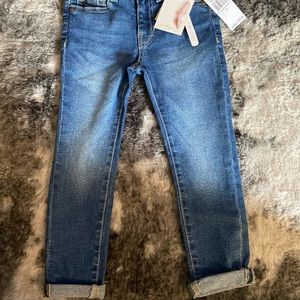 Never worn girls skinny jeans size 4